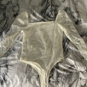 White lace body suit